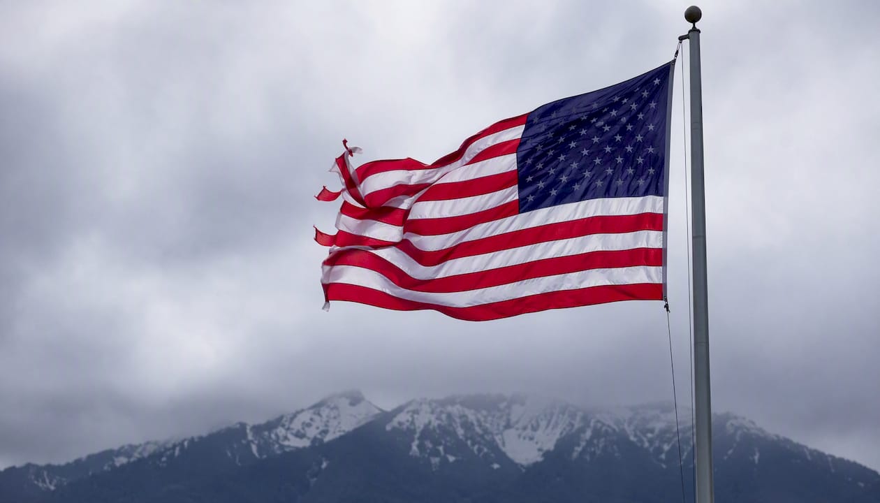 Flag fabric fluttering in wind gust