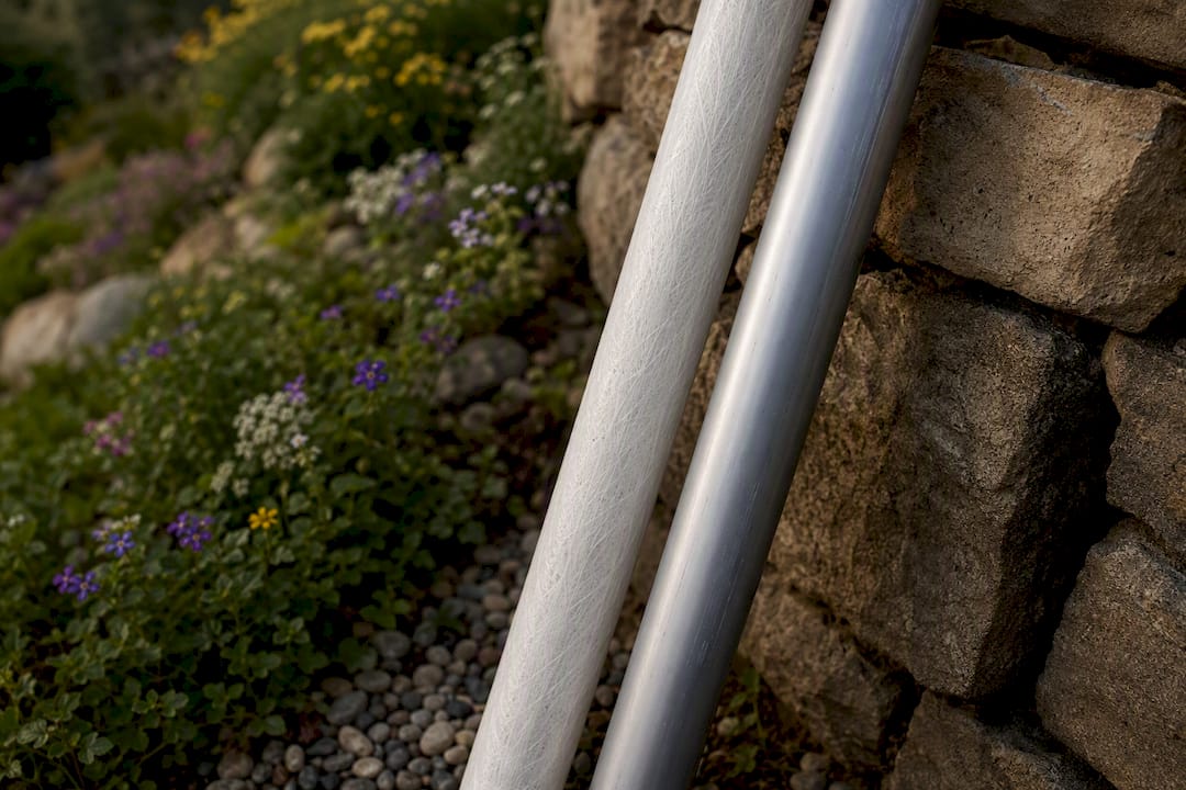 Close-up of fiberglass and aluminum flagpole sections