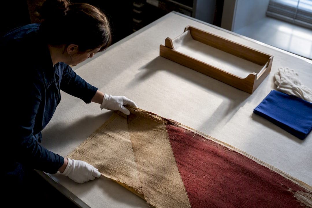 Historic Alabama banner fragment in archival care